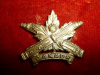 31-2, Canadian Machine Gun Corps Collar Badge  